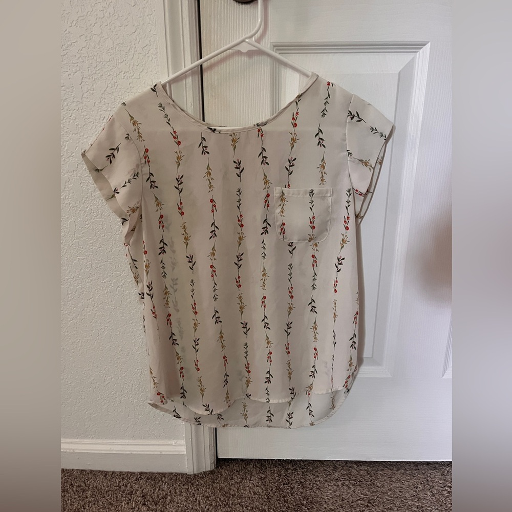 Lily White medium floral blouse.